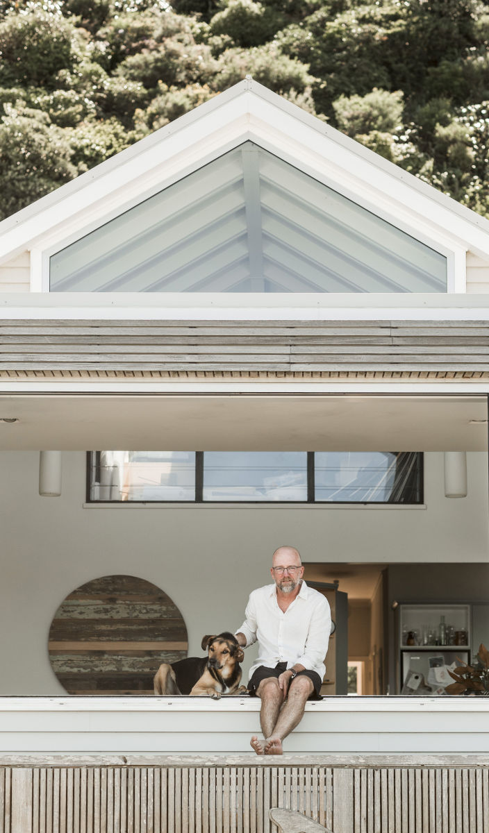Breaker Bay House owner and his dog