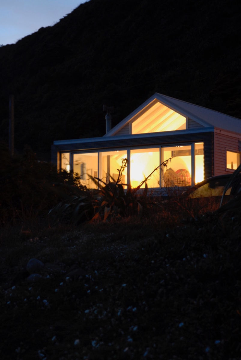 Breaker Bay house at night by Jason OHara
